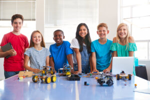 Diverse students playing with STEM toys